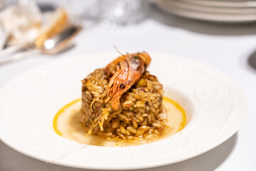 Seafood paellas, traditional Spanish Mediterranean cuisine. Rice with mussels, prawns and squid