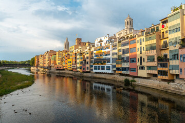 Fototapeta na wymiar Girona medieval city from the famous red bridge Pont de les Peixateries Velles, Costa Brava of Catalonia
