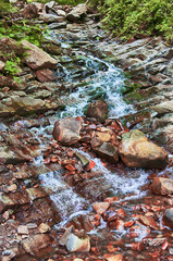 Waves of water outdoors with drops for life