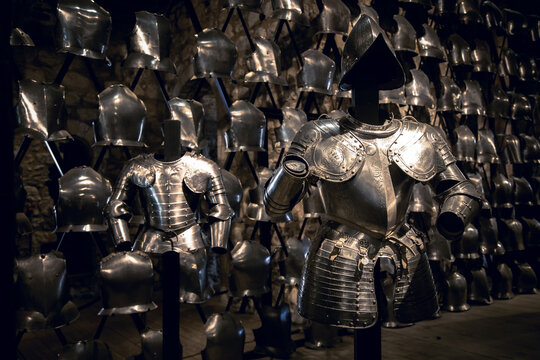 London, UK - 7th June 2017: Suits of armour and a display of breastplates in the Armoury of the Tower of London.