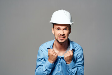 emotional man in construction helmet engineer work industry
