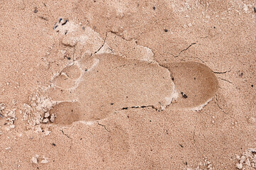 Barfußabdruck im Sand