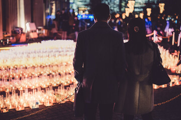 クリスマスのキャンドルとカップル（横浜みなとみらい）