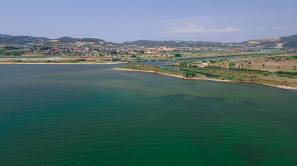 Panoramic drone clip of a small tropical peninsula in Strimonas, Macedonia, North Greece