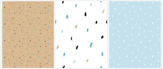 Abstract Geometric Seamless Vector Patterns. White, Gold, Black and Blue Brush Raindrops on a White, Blue and Gold Background. Irregular Spots Repeatable Print ideal for Fabric, Textile. 