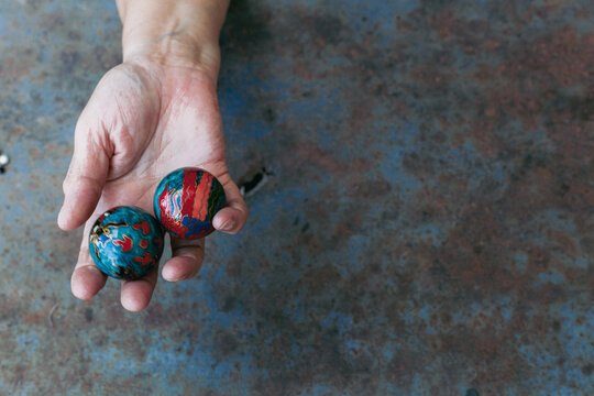 hands of senior adult woman excercising with chinese baoding balls for stress relief and deep relaxation