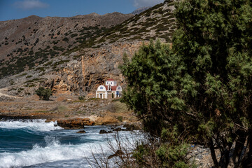 typical rural landscape with olive trees and mountains of Crete
