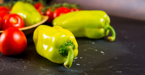 Close view of tomatoes and peppers. Vegetables from the garden. Summer bio food.
