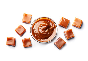 Caramel candy with caramel sauce on white backgrounds
