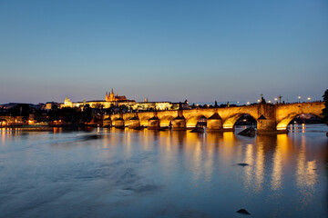 Fototapeta na wymiar Charles bridge and cityscape at sunset, Prague, Czech Republic