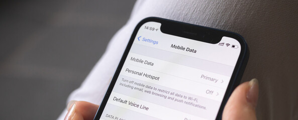Mobile data setting screen on mobile phone close-up. Cellular data on smartphone. Banner photo