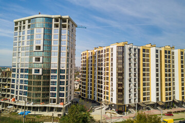 High residential apartment building under construction. Real estate development.