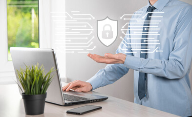 Protection network security computer and safe your data concept, Businessman holding shield protect...