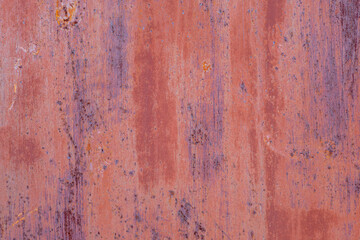 Rust on painted metal when exposed to the environment.