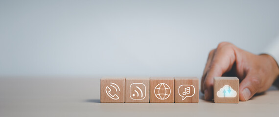 communication and technology and Cloud concept , Hand putting wooden block cube symbol telephone, email, address. Website page contact us or e-mail marketing, Contact us in customer support concept