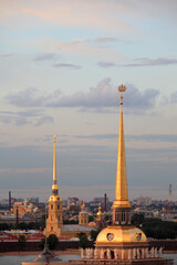 The Admiralty gilded spire, topped by a small sail warship, and Peter and Paul Cathedral, Saint...