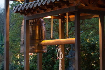 NEW TAIPEI CITY, TAIWAN - JANUARY 27, 2012:  Buddhist ringing bell at Guan Dao Guan Ying Temple