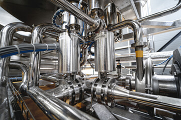 Pipes and fittings at a craft modern brewery