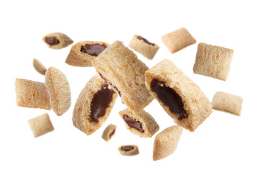 Sweet crispy corn pads flying on white background