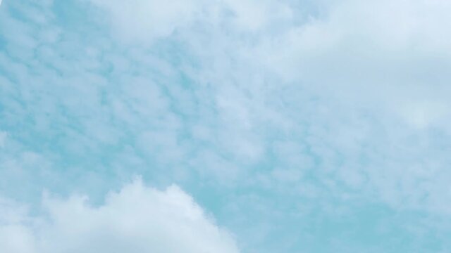 Flying and Transforming Feathery Mother-of-Pearl Clouds and Cumulus Fluffy White Clouds in the Blue Sky, Timelapse. Cloud Skyscraper. Cloudy Weather Forecast, Atmospheric Layers.