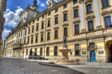 Fototapeta na wymiar Wrocław, Poland, August 2021. Famous Wrocław facades of old historic buildings, tenement houses in the Market Square (Rynek) Europe, Breslau