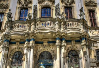 Obraz premium Wrocław, Poland, August 2021. Famous Wrocław facades of old historic buildings, tenement houses in the Market Square (Rynek) Europe, Breslau