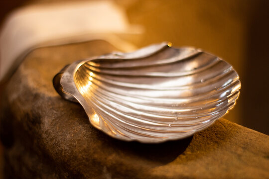 Silver Shell For Holy Water In Christian Religious Baptism.