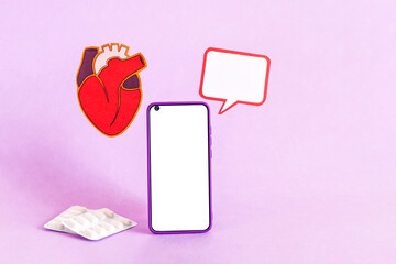 Smart phone and heart health insurance, world heart day, world health day.