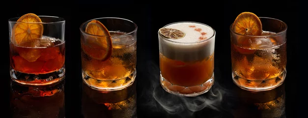 Fotobehang Alcohol cocktails: Whiskey stout sour, smoked negroni, Old fashioned cocktail with orange slice on black background © Oleg