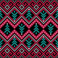 Green Christmas tree and red zigzag pattern on black background 