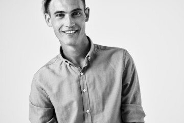 man with fashionable hairstyle holding the collar fashion self-confidence Studio