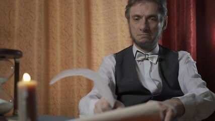 The man in the suit of President Abraham Lincoln portrait