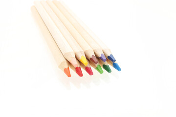Wooden colorful pencils isolated on white