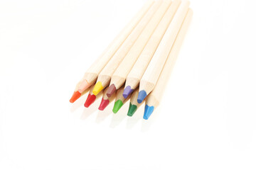 Wooden colorful pencils isolated on white