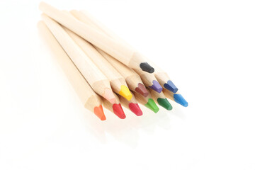 Wooden colorful pencils isolated on white