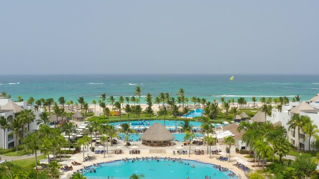 Landscape of a beautiful hotel on the Caribbean coast from a bird's eye view. A luxurious getaway on a palm-fringed white sand beach on the Cote d'Azur. Hard Rock Hotel, Punta Cana, Dominican Republic