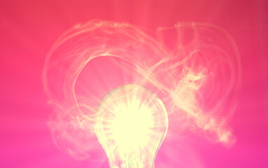 the concept of a brilliant idea in the form of a burning light bulb on a pink background