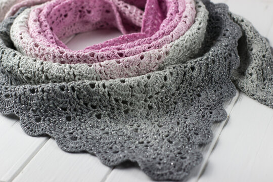 Knitted neckerchief. Bactus is gray-pink in color. Women's scarf