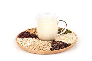 Tofu juice and whole grains isolated on white surface.