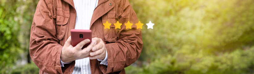 Close up on customer user give rating to service experience on online application. Customer review...