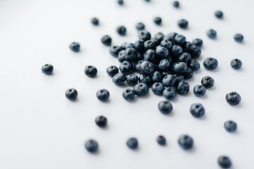 A bunch of ripe, beautiful blueberries, blueberries close-up on a white background. Healthy food, and vitamins.