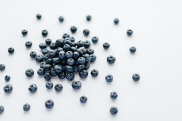 A bunch of ripe, beautiful blueberries, blueberries close-up on a white background. Healthy food, and vitamins.