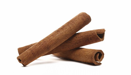 Cinnamon sticks pile isolated on white background