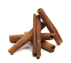Cinnamon sticks pile isolated on white background