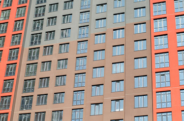 Multi-apartment building. Construction of a multistory building. Modern architecture.