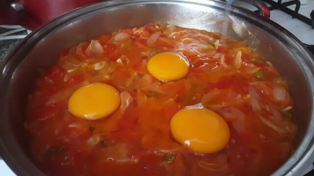 Menemen dish made with onions, peppers, tomatoes and eggs