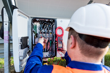 The inspector checks the actual output voltage level of inverter