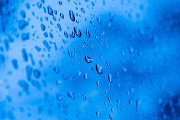 water on mirror, rainy day, abstract background