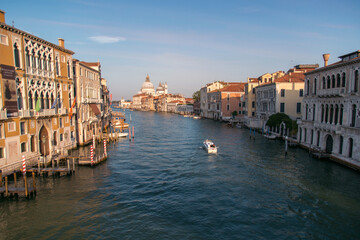 Fototapeta na wymiar Panoramic view of famous Canal Grande from famous Rialto Bridge at sunset in Venice, Italy