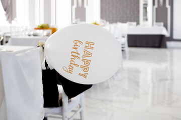 Inflatable layer with inscription happy birthday in restaurant